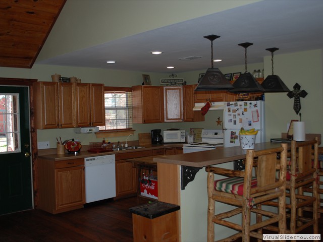 Kitchen includes coffee maker, microwave, dishwasher, stove top over and full sized fridge.<br/>
